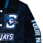 personalized-creighton-bluejays-hexagon-mesh-blue-black-varsity-jacket-best-selling.webp