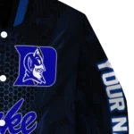 personalized-duke-blue-devils-hexagon-mesh-blue-black-varsity-jacket-best-selling.webp