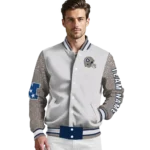 personalized-georgetown-hoyas-speckled-arms-blue-gray-varsity-jacket-best-selling.webp