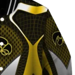 personalized-iowa-hawkeyes-mesh-chest-gold-black-varsity-jacket-best-selling.webp