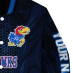 personalized-kansas-jayhawks-hexagon-mesh-blue-black-varsity-jacket-best-selling.webp