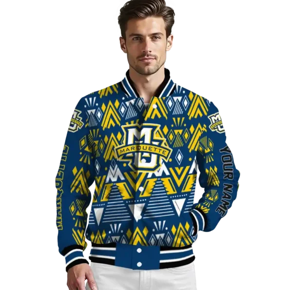 personalized marquette golden eagles pyramid shapes blue varsity jacket high quality.webp