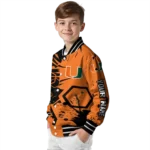 personalized-miami-hurricanes-hexagon-cluster-orange-black-varsity-jacket-best-selling.webp