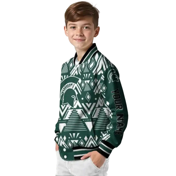 personalized michigan state spartans pyramid shapes green varsity jacket trendy.webp