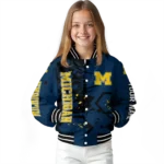 personalized-michigan-wolverines-hexagon-cluster-blue-black-varsity-jacket-best-selling.webp