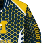 personalized michigan wolverines hexagon grid blue varsity jacket best selling.webp