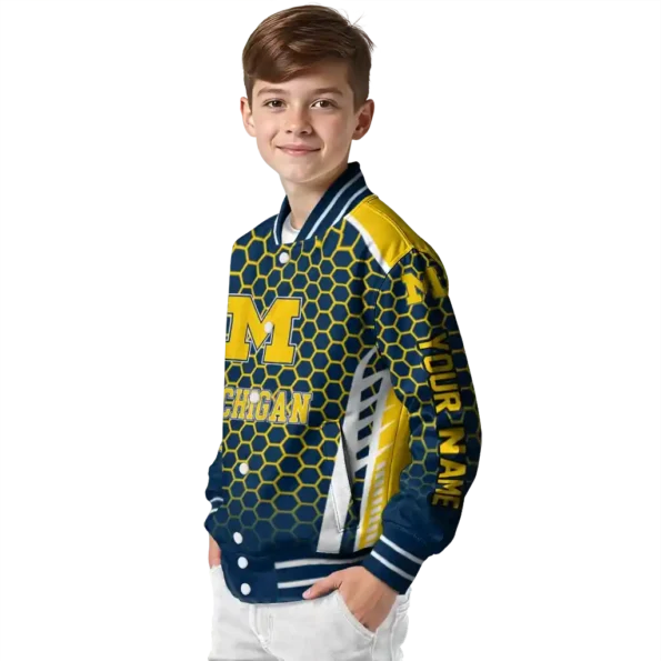 personalized michigan wolverines hexagon grid blue varsity jacket trendy.webp