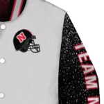 personalized-nebraska-cornhuskers-speckled-arms-red-gray-varsity-jacket-best-selling.webp