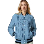 personalized-north-carolina-tar-heels-bolt-stripe-light-blue-varsity-jacket-best-selling.webp