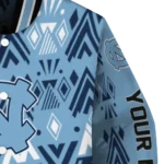 personalized-north-carolina-tar-heels-pyramid-shapes-light-blue-varsity-jacket-best-selling.webp