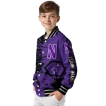 personalized-northwestern-wildcats-hexagon-cluster-purple-black-varsity-jacket-best-selling.webp