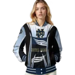personalized-notre-dame-fighting-irish-mesh-effect-navy-black-varsity-jacket-best-selling.webp