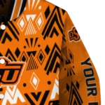 personalized-oklahoma-state-cowboys-pyramid-shapes-orange-varsity-jacket-best-selling.webp