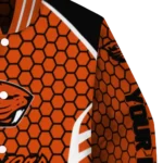 personalized-oregon-state-beavers-hexagon-grid-orange-varsity-jacket-best-selling.webp