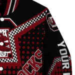 personalized-south-carolina-gamecocks-star-burst-garnet-varsity-jacket-best-selling.webp