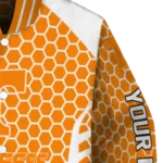 personalized-tennessee-volunteers-hexagon-grid-orange-varsity-jacket-best-selling.webp