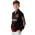 personalized-texas-am-aggies-hexagon-mesh-maroon-black-varsity-jacket-best-selling.webp