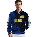 personalized-toledo-rockets-hexagon-mesh-blue-black-varsity-jacket-best-selling.webp