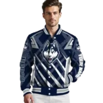 personalized-uconn-huskies-chevron-angles-blue-varsity-jacket-best-selling.webp