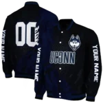 personalized-uconn-huskies-hexagon-mesh-blue-black-varsity-jacket-best-selling.webp