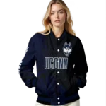 personalized-uconn-huskies-hexagon-mesh-blue-black-varsity-jacket-best-selling.webp