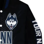 personalized-uconn-huskies-hexagon-mesh-blue-black-varsity-jacket-best-selling.webp