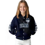 personalized-uconn-huskies-hexagon-mesh-blue-black-varsity-jacket-best-selling.webp