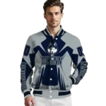 personalized-uconn-huskies-spider-mark-blue-grey-varsity-jacket-best-selling.webp