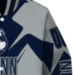 personalized-uconn-huskies-spider-mark-blue-grey-varsity-jacket-best-selling.webp