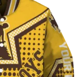 personalized-wyoming-cowboys-star-burst-brown-varsity-jacket-best-selling.webp