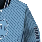 customized-north-carolina-tar-heels-chevron-arrow-light-blue-varsity-jacket-best-selling.webp