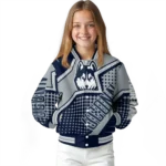 customized-uconn-huskies-star-burst-blue-varsity-jacket-best-selling.webp