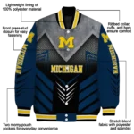 michigan-wolverines-arrow-layer-blue-black-varsity-jacket-best-selling.webp
