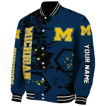 personalized-michigan-wolverines-hexagon-cluster-blue-black-varsity-jacket-best-selling.webp