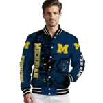 personalized-michigan-wolverines-hexagon-cluster-blue-black-varsity-jacket-best-selling.webp