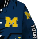 personalized-michigan-wolverines-hexagon-cluster-blue-black-varsity-jacket-best-selling.webp