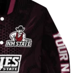 personalized-new-mexico-state-aggies-hexagon-mesh-crimson-black-varsity-jacket-best-selling.webp