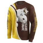 customized wyoming cowboys peeking snoopy brown hoodie best selling