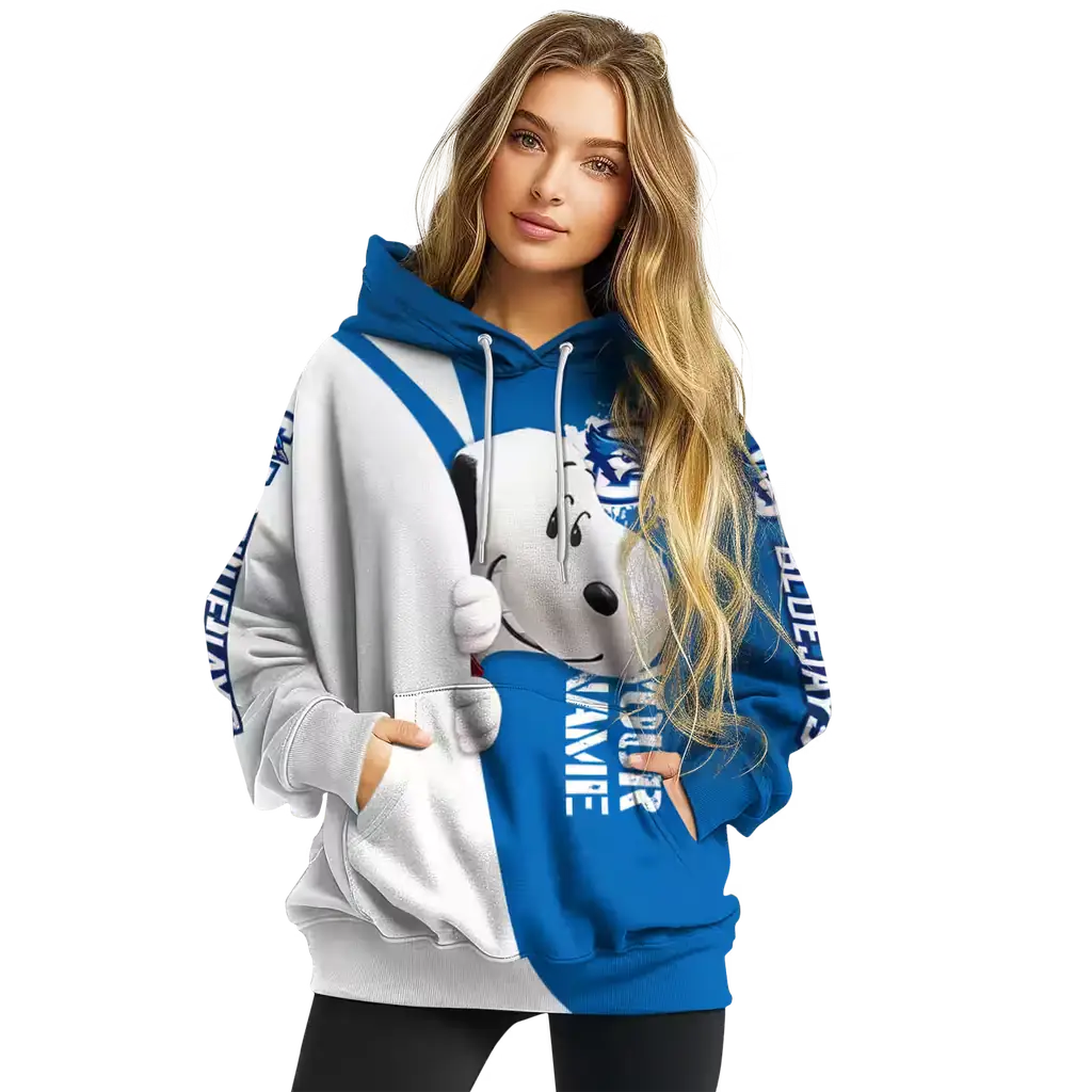 personalized creighton bluejays peeking snoopy blue hoodie high quality personalized creighton bluejays peeking snoopy blue hoodie high quality