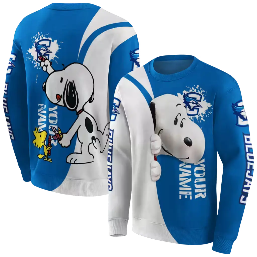 personalized creighton bluejays peeking snoopy blue hoodie premium grade personalized creighton bluejays peeking snoopy blue hoodie premium grade