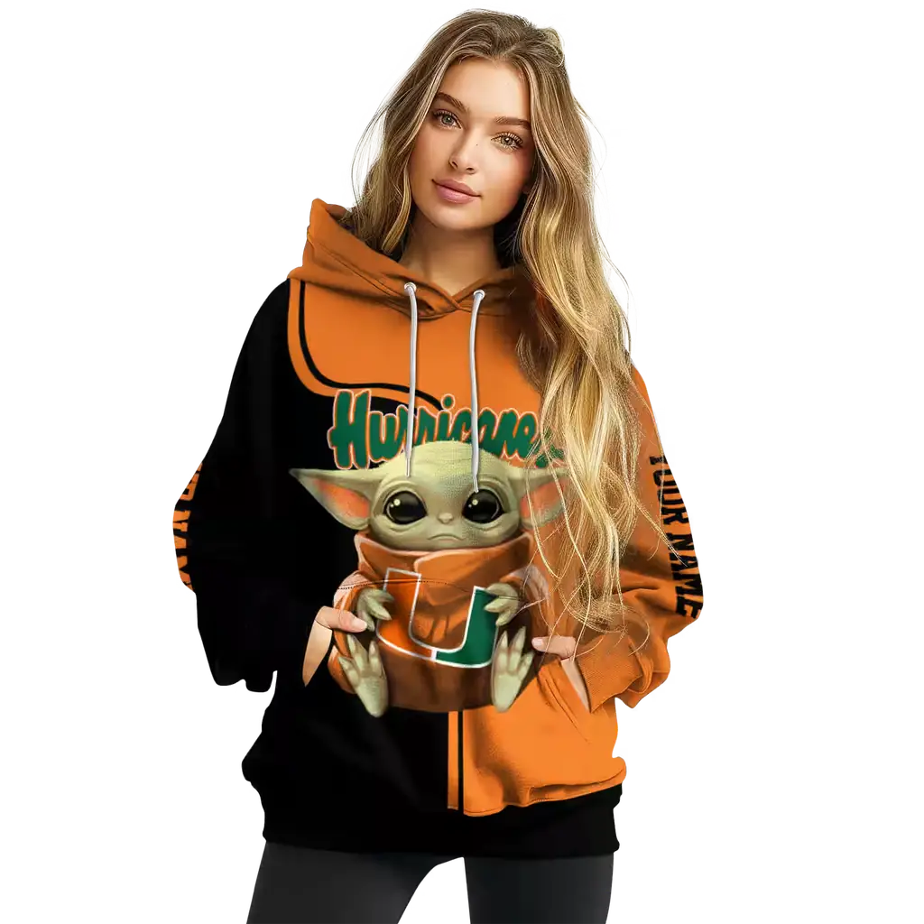 personalized miami hurricanes baby yoda orange black hoodie high quality personalized miami hurricanes baby yoda orange black hoodie high quality