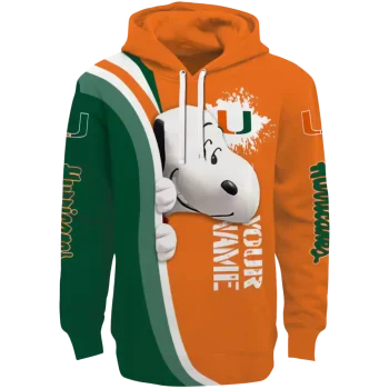 personalized miami hurricanes peeking snoopy orange hoodie best selling