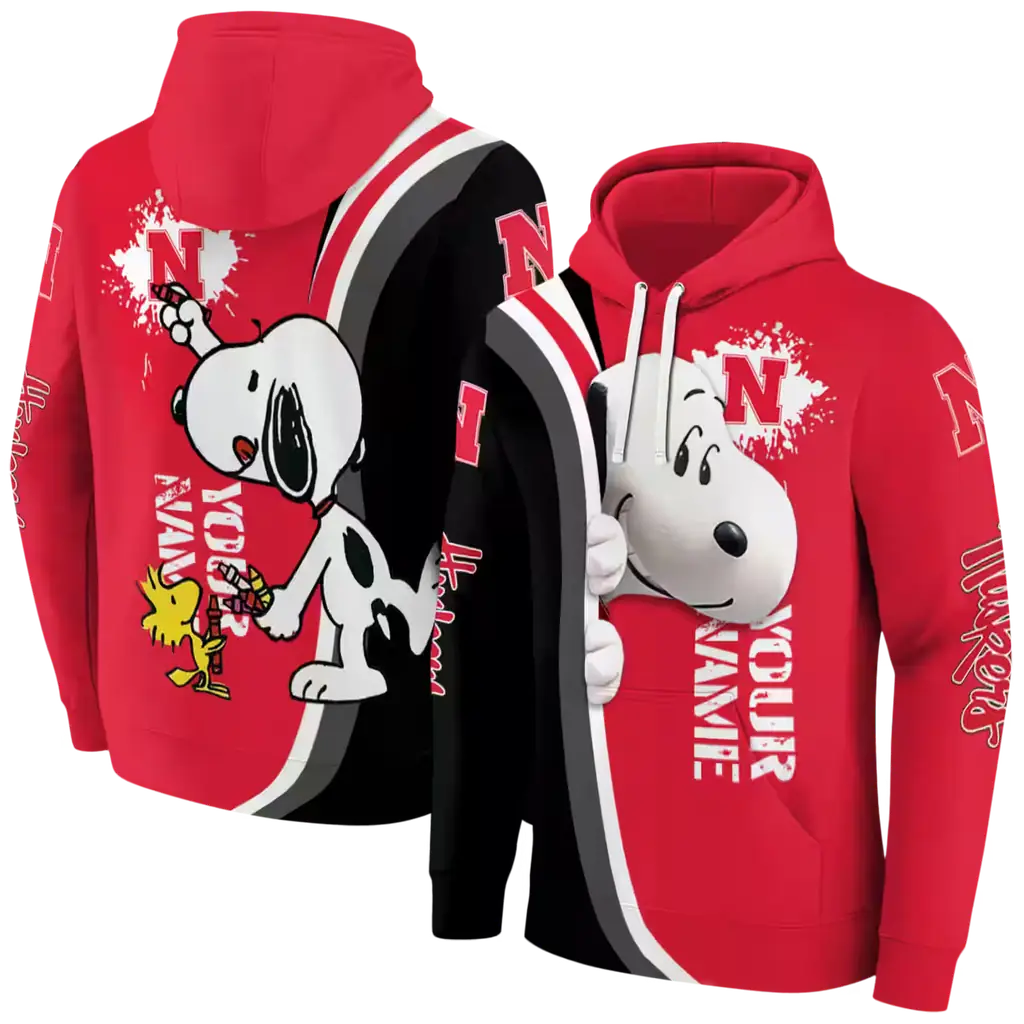 personalized nebraska cornhuskers peeking snoopy red hoodie fashion forward personalized nebraska cornhuskers peeking snoopy red hoodie fashion forward