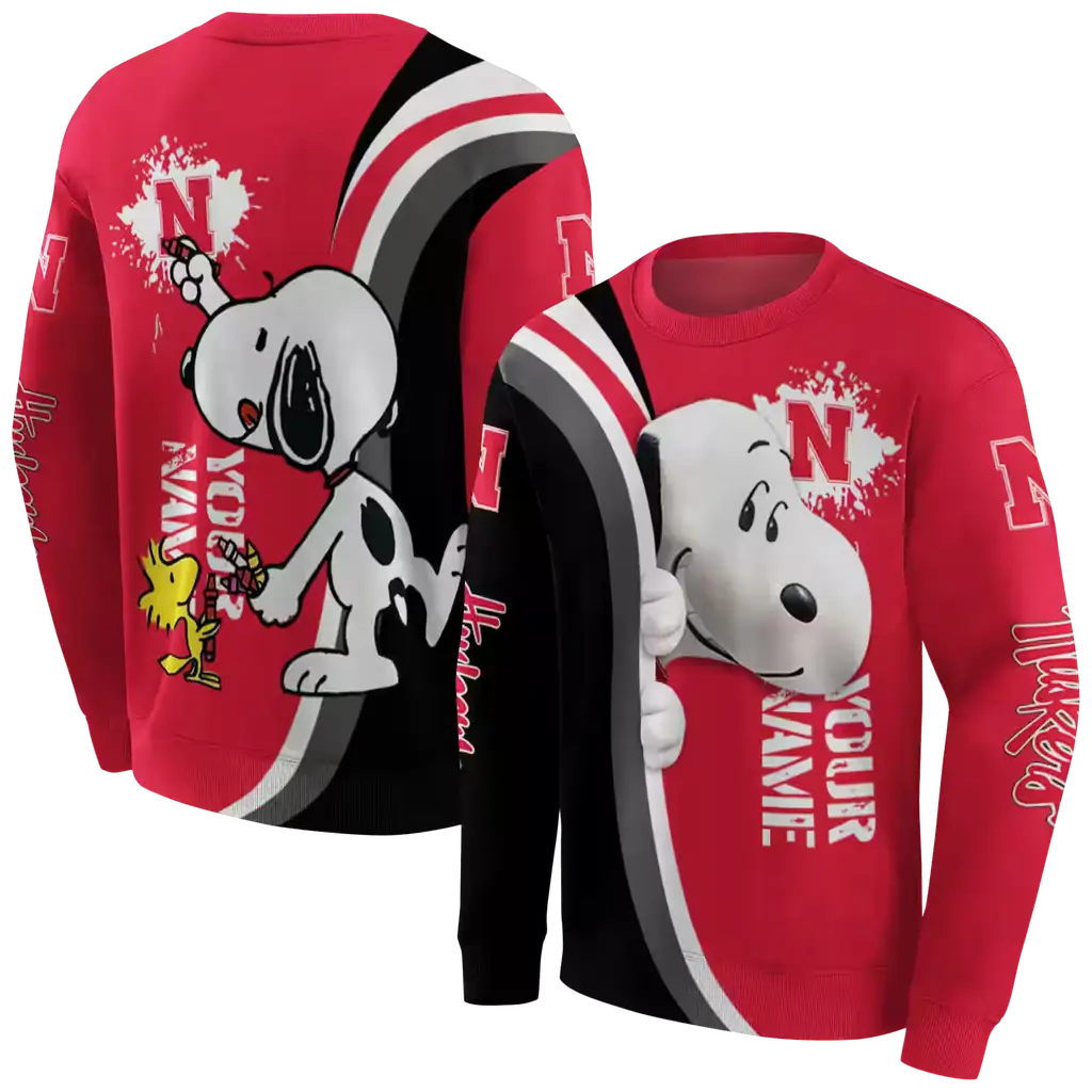 personalized nebraska cornhuskers peeking snoopy red hoodie premium grade personalized nebraska cornhuskers peeking snoopy red hoodie premium grade